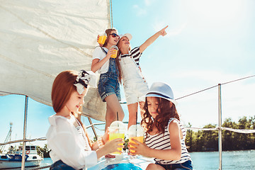 Image showing The children on board of sea yacht