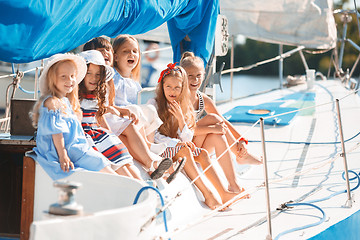 Image showing The children on board of sea yacht