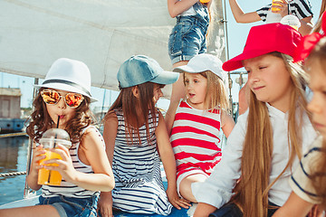 Image showing The children on board of sea yacht