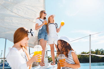 Image showing The children on board of sea yacht