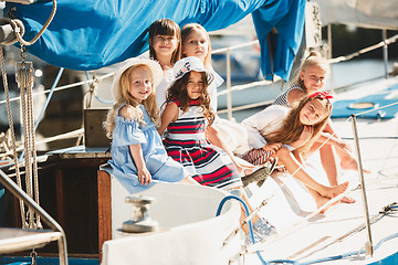 Image showing The children on board of sea yacht