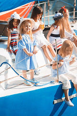 Image showing The children on board of sea yacht