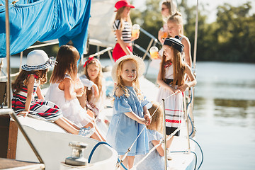 Image showing The children on board of sea yacht