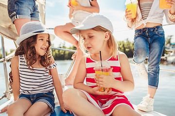 Image showing The children on board of sea yacht