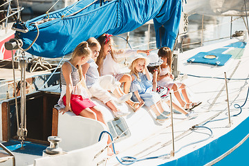 Image showing The children on board of sea yacht