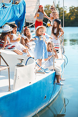 Image showing The children on board of sea yacht