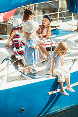 Image showing The children on board of sea yacht