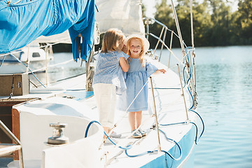 Image showing The children on board of sea yacht