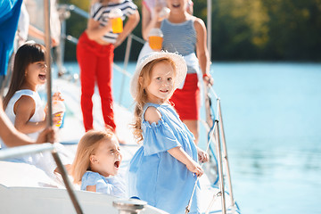 Image showing The children on board of sea yacht