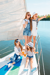 Image showing The children on board of sea yacht