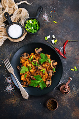 Image showing Fried mushrooms and cabbage