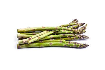 Image showing Bunch of fresh raw garden asparagus isolated on white background