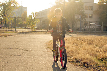 Image showing Happy boy ride the bicycle