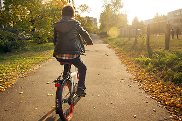 Image showing Happy boy ride the bicycle