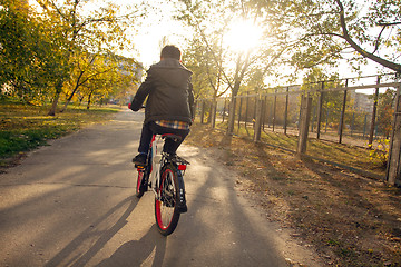 Image showing Happy boy ride the bicycle