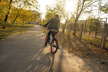 Image showing Happy boy ride the bicycle