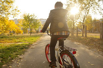 Image showing Happy boy ride the bicycle