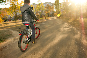 Image showing Happy boy ride the bicycle