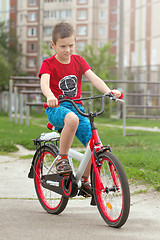 Image showing Happy boy ride the bicycle