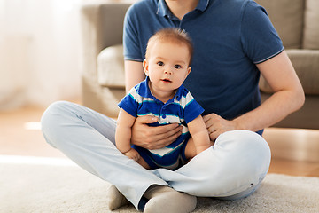 Image showing baby boy with father at home