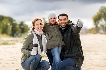 Image showing happy family outdoors in autumn