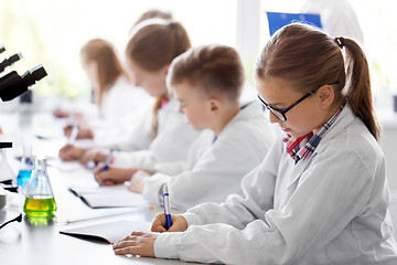 Image showing kids studying chemistry at school laboratory