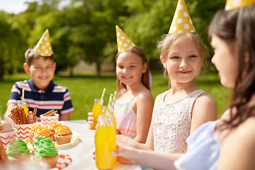 Image showing happy kids on birthday party at summer garden