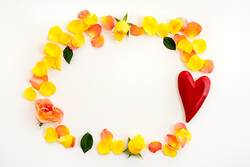 Image showing Red heart and rose petals frame