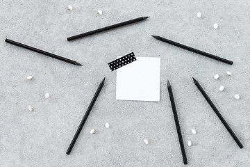 Image showing Blank note paper and sharp black pencils