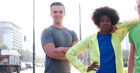 Image showing Portrait of multiethnic group of young people on the jogging