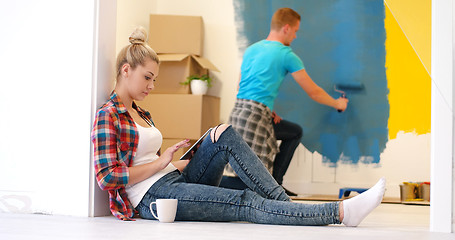 Image showing couple doing home renovations