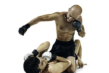 Image showing Two professional boxer boxing isolated on white studio background