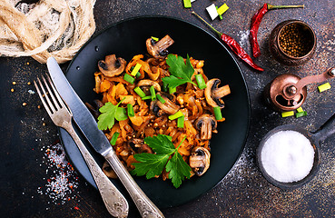 Image showing Fried mushrooms and cabbage