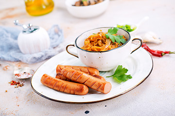 Image showing sausages with cabbage