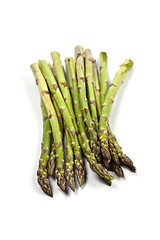 Image showing Bunch of fresh raw garden asparagus isolated on white background