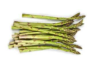 Image showing Bunch of fresh raw garden asparagus isolated on white background