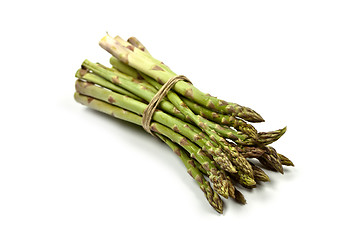 Image showing Bunch of fresh raw garden asparagus isolated on white background