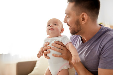 Image showing close up of father with little baby girl at home