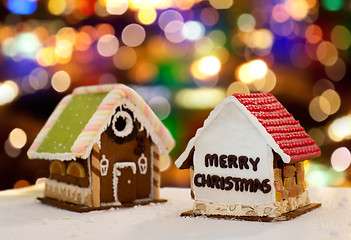 Image showing gingerbread houses over christmas lights