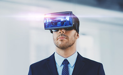 Image showing businessman with virtual reality headset at office