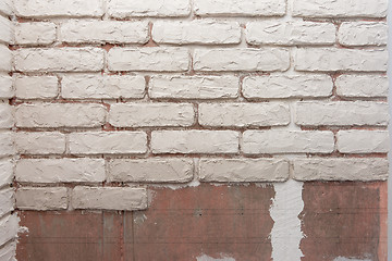 Image showing Unfinished imitation of brickwork on the wall