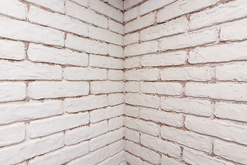 Image showing Corner, on the walls of which imitation brickwork is laid