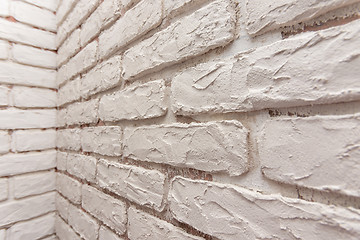 Image showing Designer hand-made imitation brickwork on the wall of the apartment