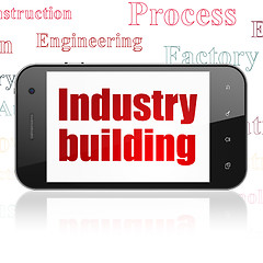 Image showing Industry concept: Smartphone with Industry Building on display