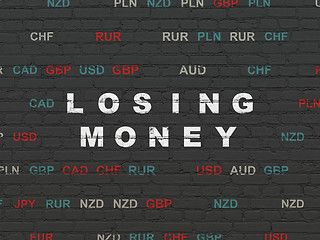 Image showing Currency concept: Losing Money on wall background