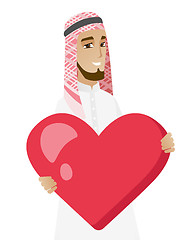 Image showing Muslim businessman holding a big red heart.