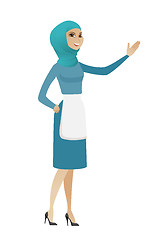 Image showing Muslim cleaner pointing at something by hand.