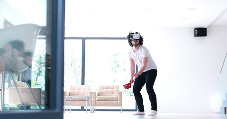 Image showing man using VR-headset glasses of virtual reality