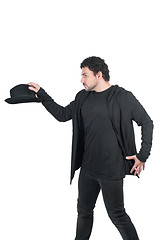 Image showing Man in black with his black hat