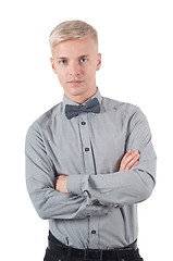 Image showing Male in shirt and bow-tie standing